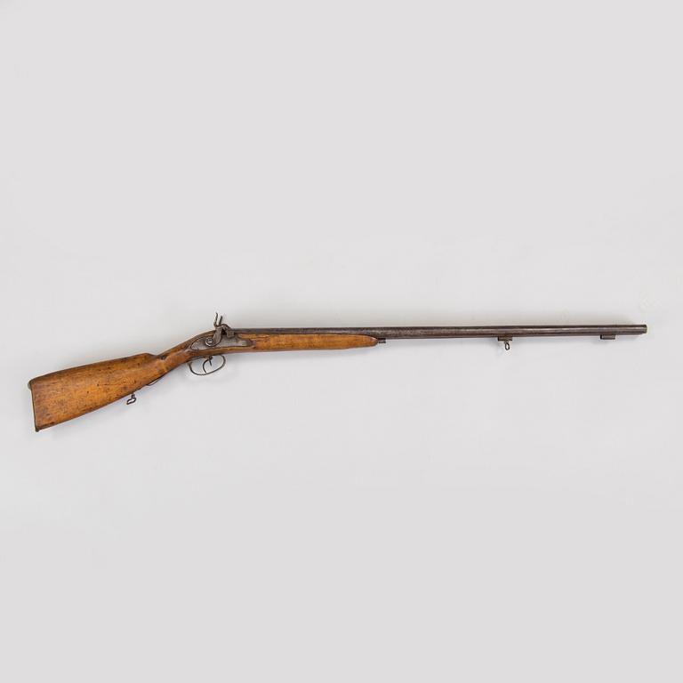 A double barrel caplock rifle mid 1800s.