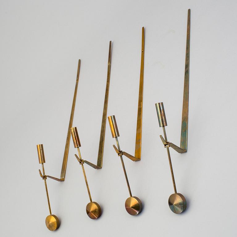 A set of four wall sconce by Pierre Forsell, Skultuna.
