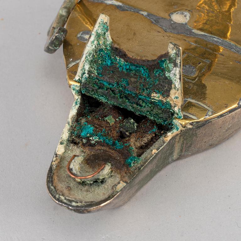 An 18th century bronze oil lamp.