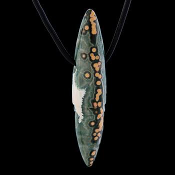 A BERND MUNSTEINER PENDANT, "Symbolon", cut jasper, leather.