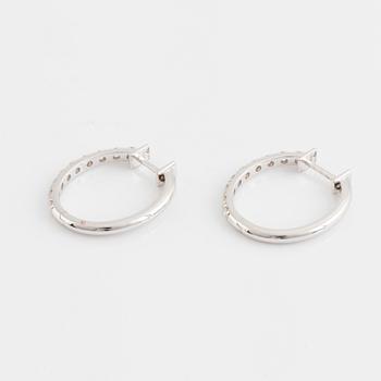 Brilliant cut diamond hoop earrings.