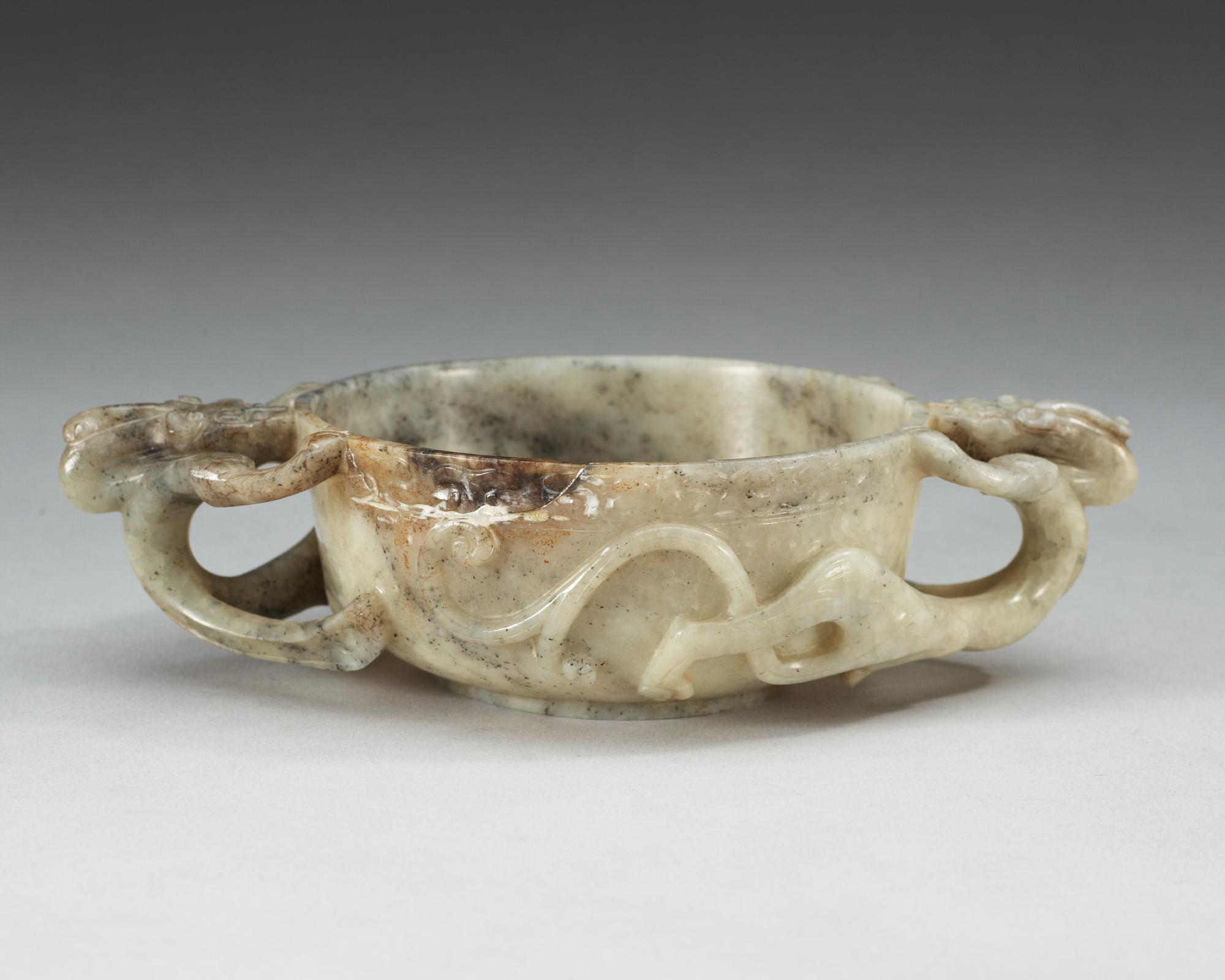 A carved nephrite ceremonial wine cup, late Qing dynasty.