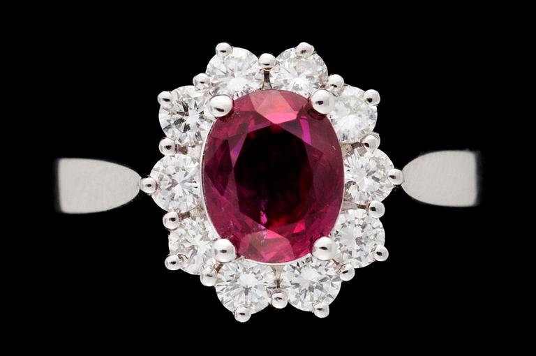 A gold, ruby and diamond ring.