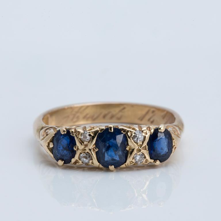 A sapphire and old-cut diamond ring, 1908.