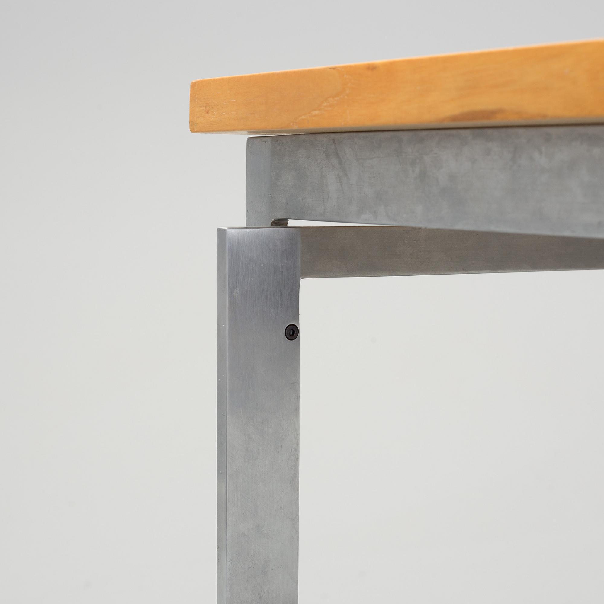 A Poul Kjaerholm "PK-55" table from Fritz Hansen, Denmark.