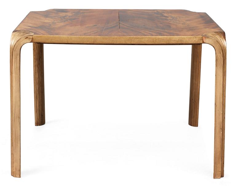 An Alvar Aalto mahogany and stained beech "Fan-leg table" by Artek, Finland.