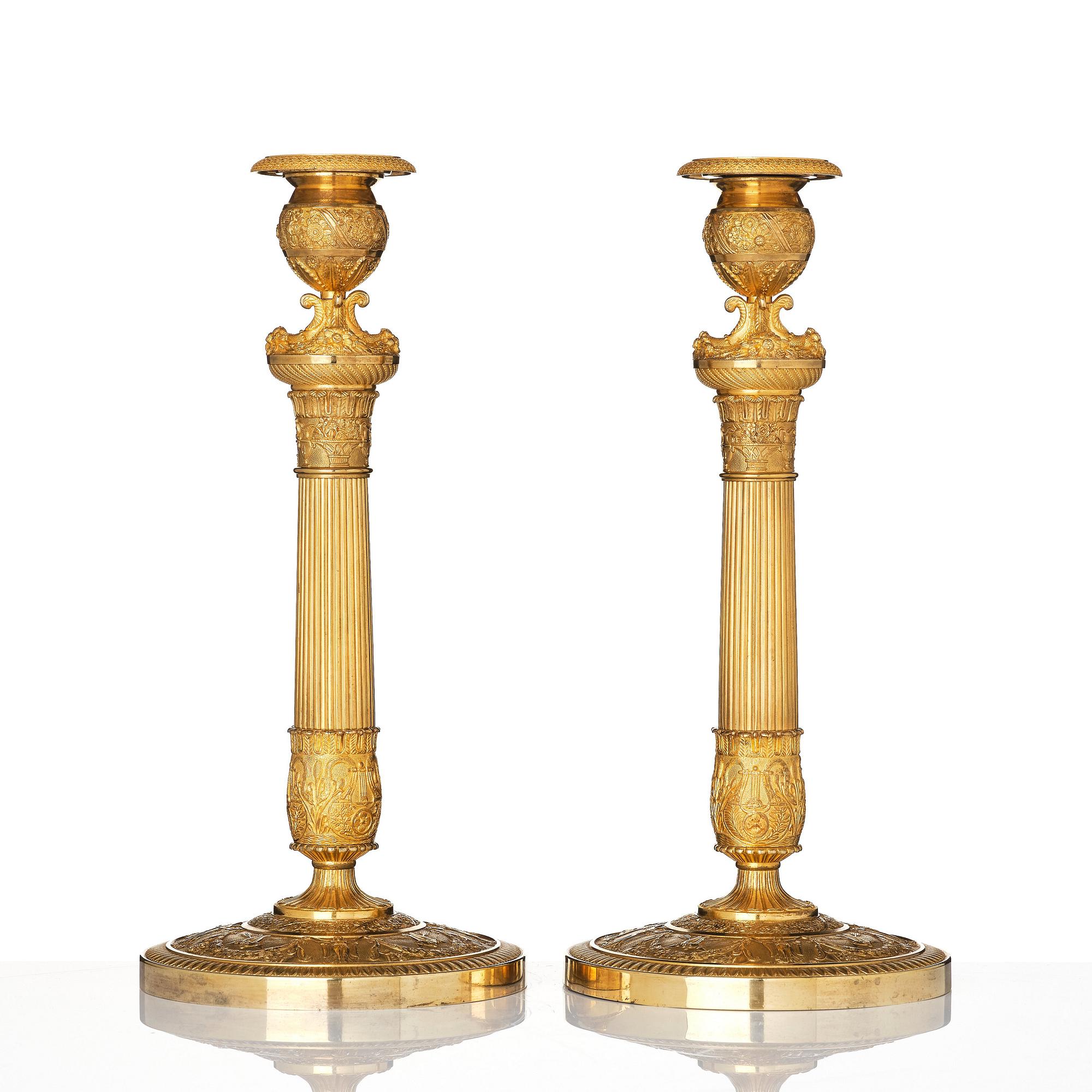A pair of French Empire candlesticks, early 19th century.