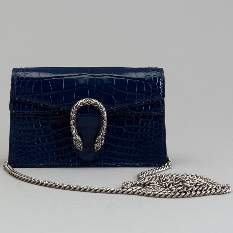 A blue crocodile limited edition  "Dionysus" handbag/evening bag by Gucci.