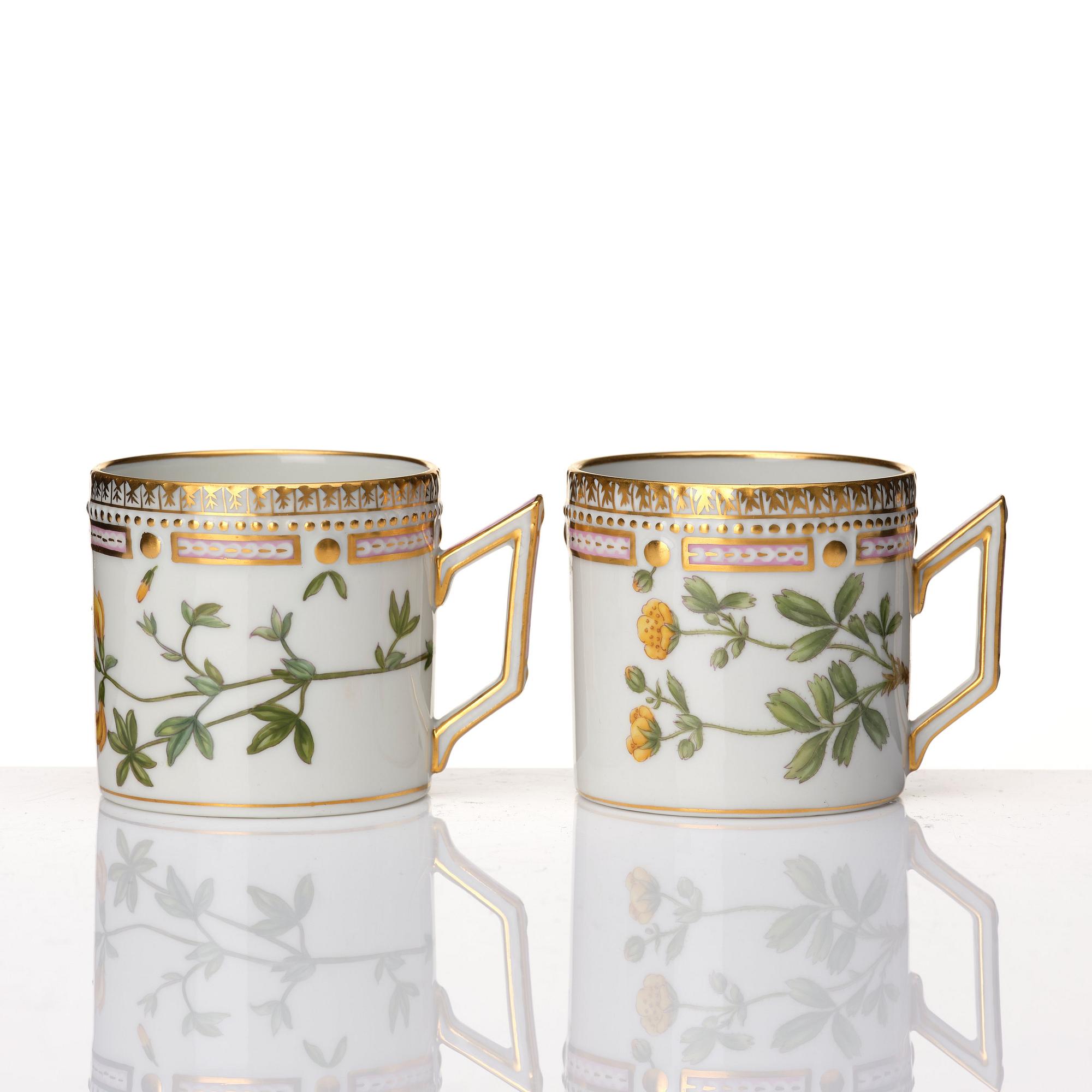 A set of 12 Royal Copenhagen 'Flora Danica' coffee cups with stands, Denmark, 20th Century.