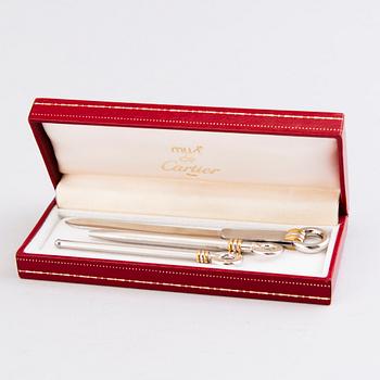 A PEN, CHAMPAGNE BEATER and BOOK MARK, must de Cartier.