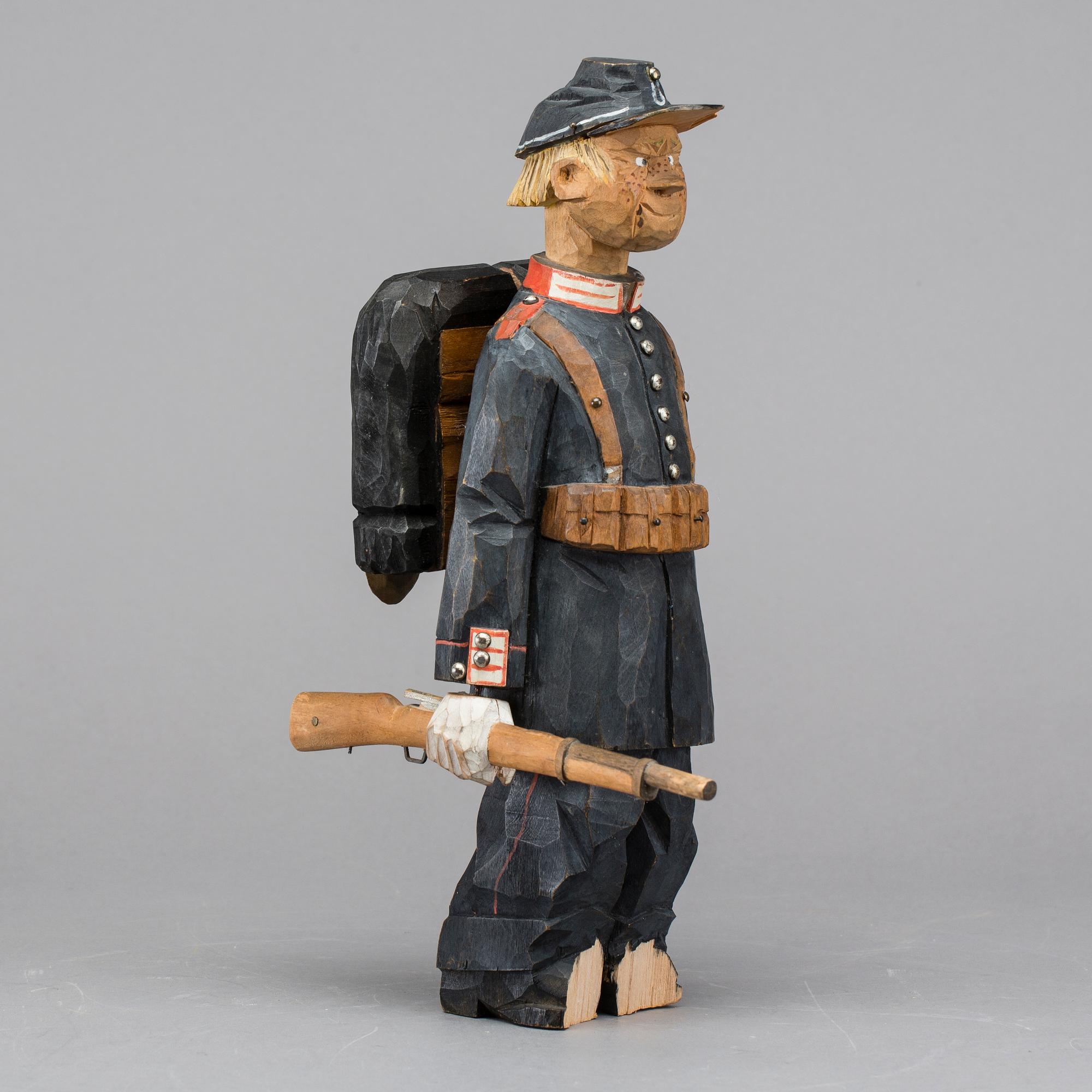 TWO WOOD SCULPTURES, one signed Axel Ericsson.