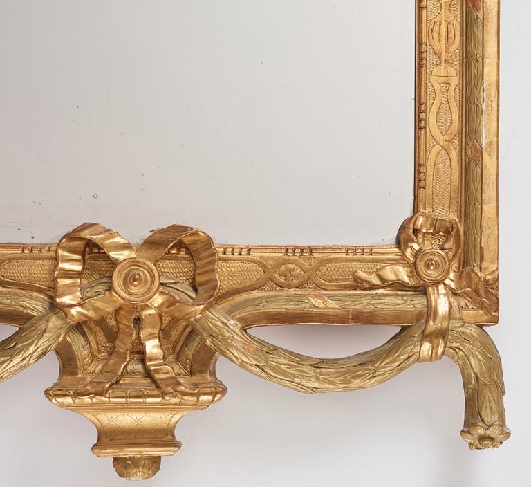 A Gustavian carved and giltwood mirror by J. Åkerblad (master in Stockholm 1758-99).