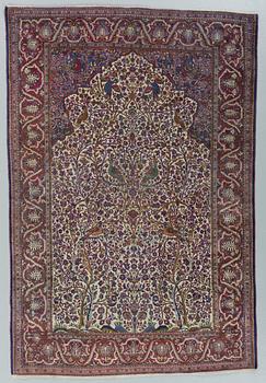 A CARPET, a semi-antique silk Kashan, ca 198,5 x 137 cm.