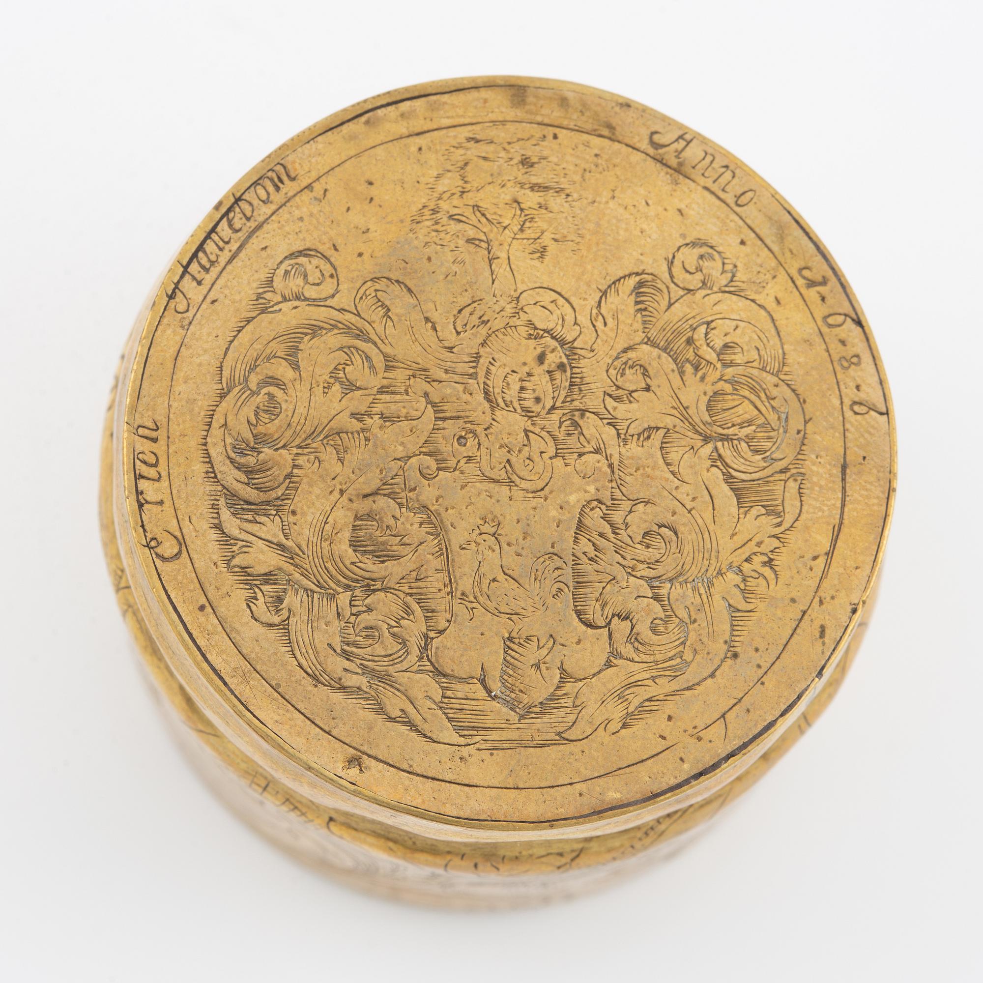 A presumably German baroque brass box, dated 1686.