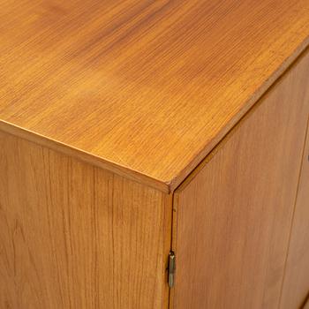 A 1950's/60's teak cabinet.