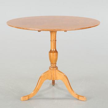 A folding table, made in the first half of the 20th century.