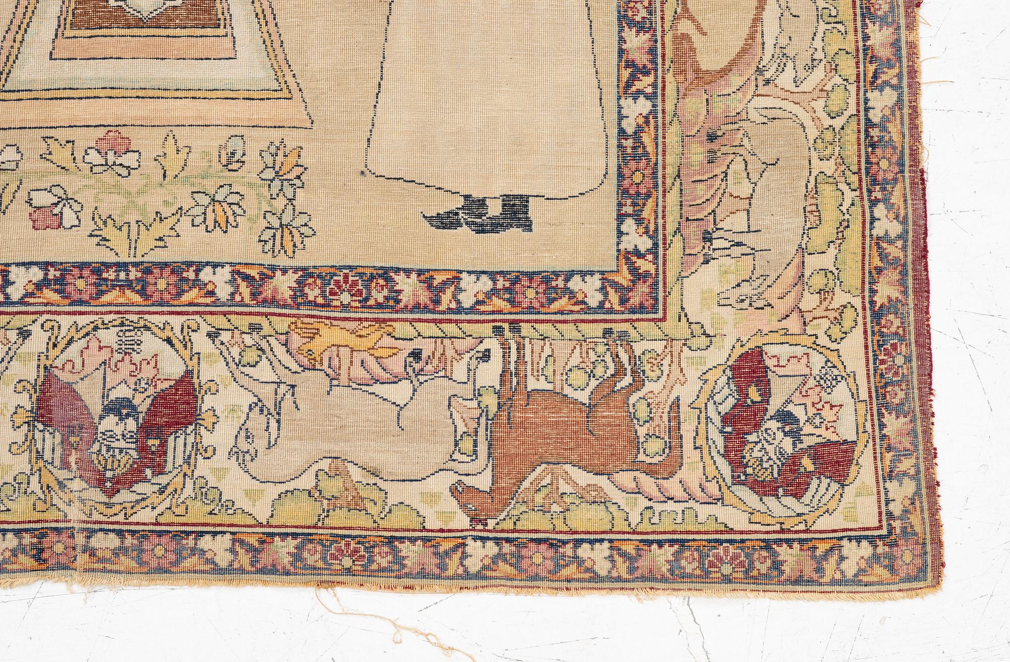 An antique Kerman Laver rug, South Persia, signed c.206 x 133 cm.
