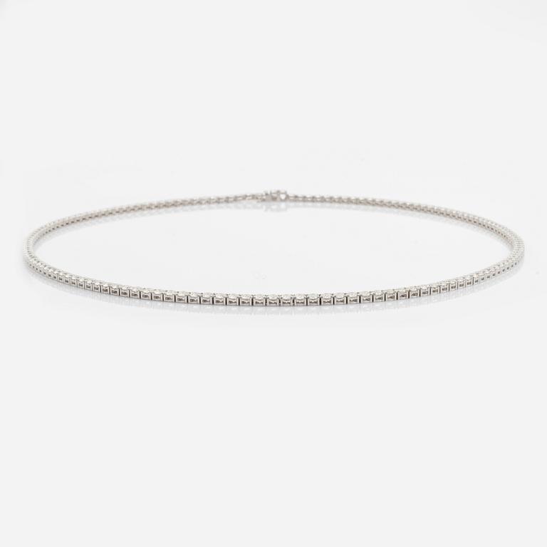 An 18K white gold necklace set with 148 round brilliant-cut diamonds.