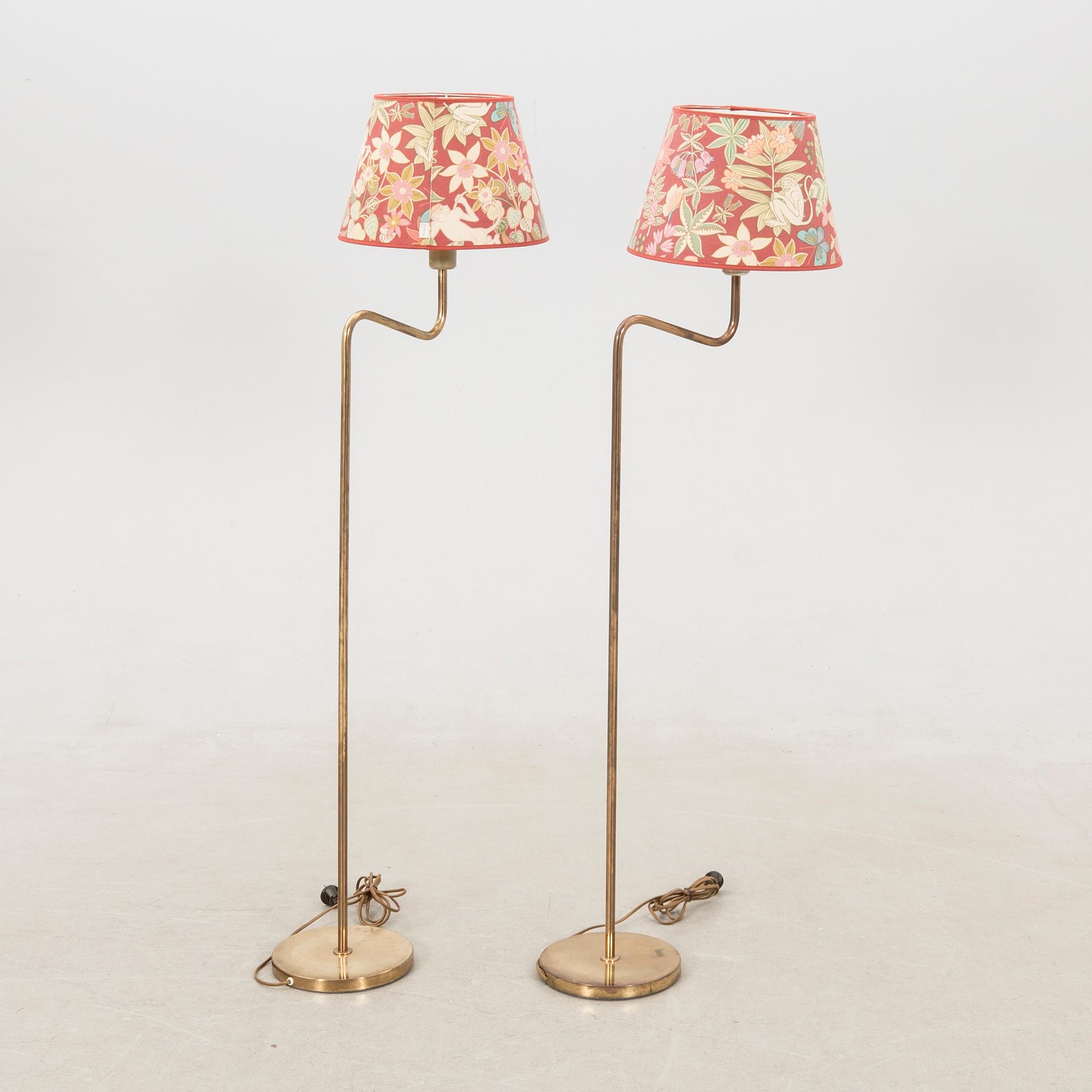 Floor lamps, a pair probably Aneta, late 1900s.