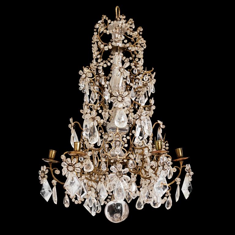 A presumably Italian Baroque and Baroque-style rock crystal and cut-glass six-branch chandelier, 18th century and later.