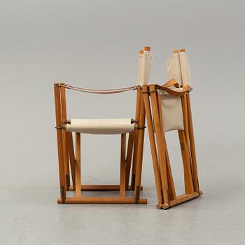 Mogens Koch, a set of four folding chairs, Kado, late 20th century.