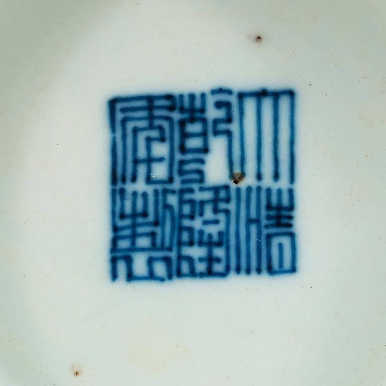 A blue, white and red bowl, late Qing dynasty with Qianlong seal mark.