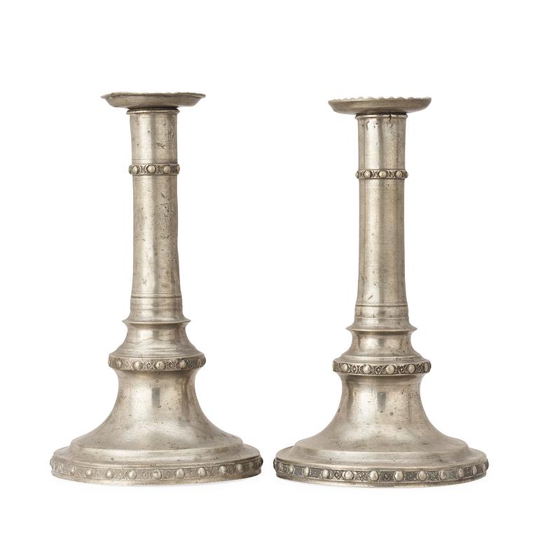 A pair of Gustavian pewter candlesticks by M Moberg 1786.