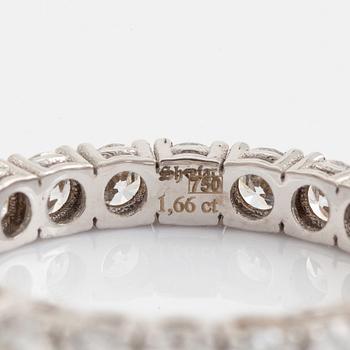 Brilliant cut diamond eternity ring.