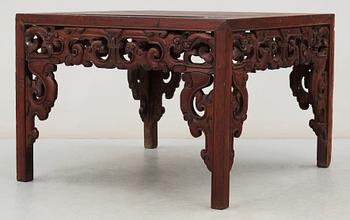 A hardwood free standing table, Qing dynasty, presumably 18th Century.