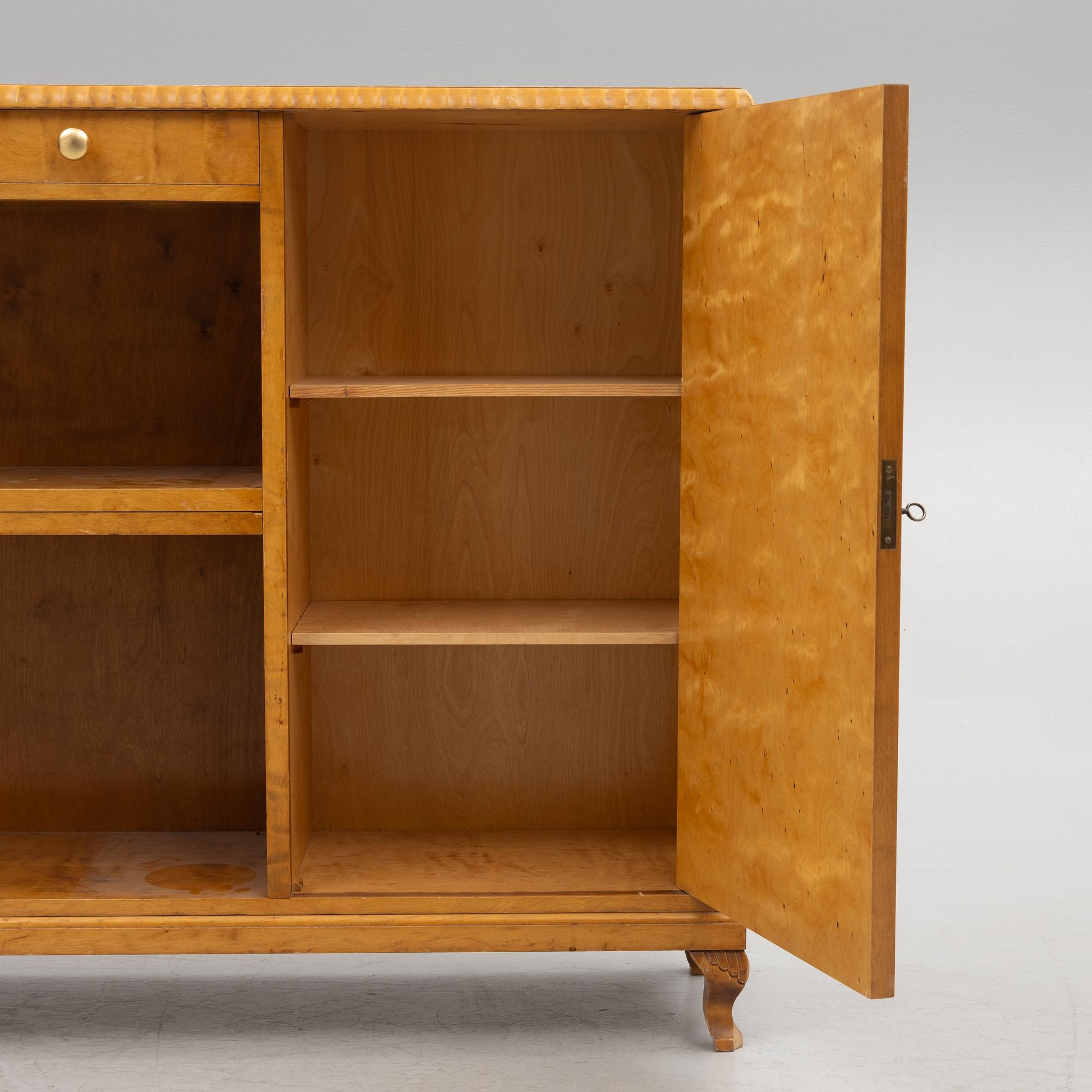 A bookcase with cabinet, 1940's.
