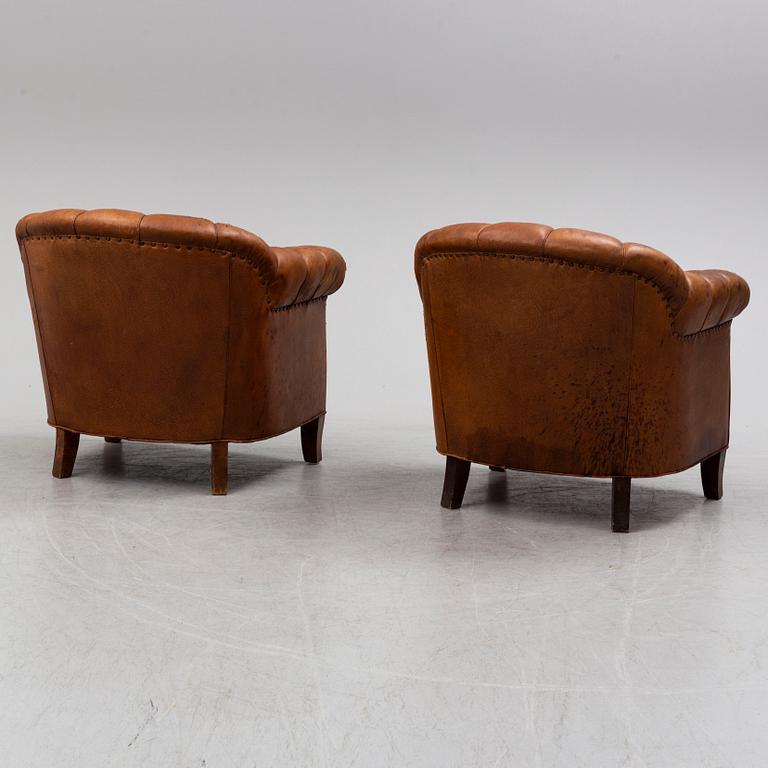 A pair of armchairs from the first half of the 20th century.