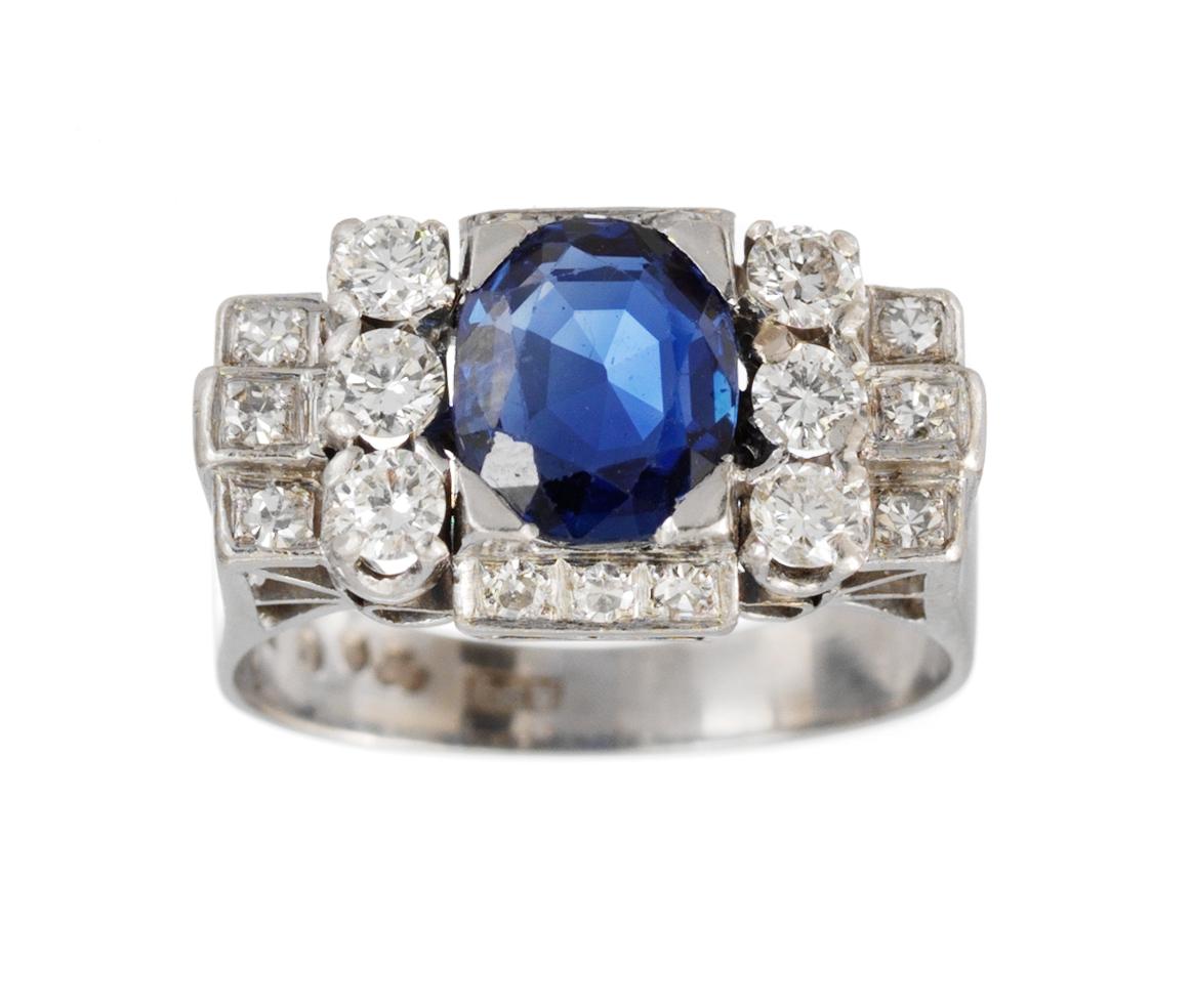 RING, platinum set with brilliant- and eight cut diamonds and blue sapphire.