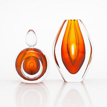 Mona Morales-Schildt, a 1960s 'Ventana' glass bowl, and a bottle, Kosta. Vase marked with label, the bottle signed.