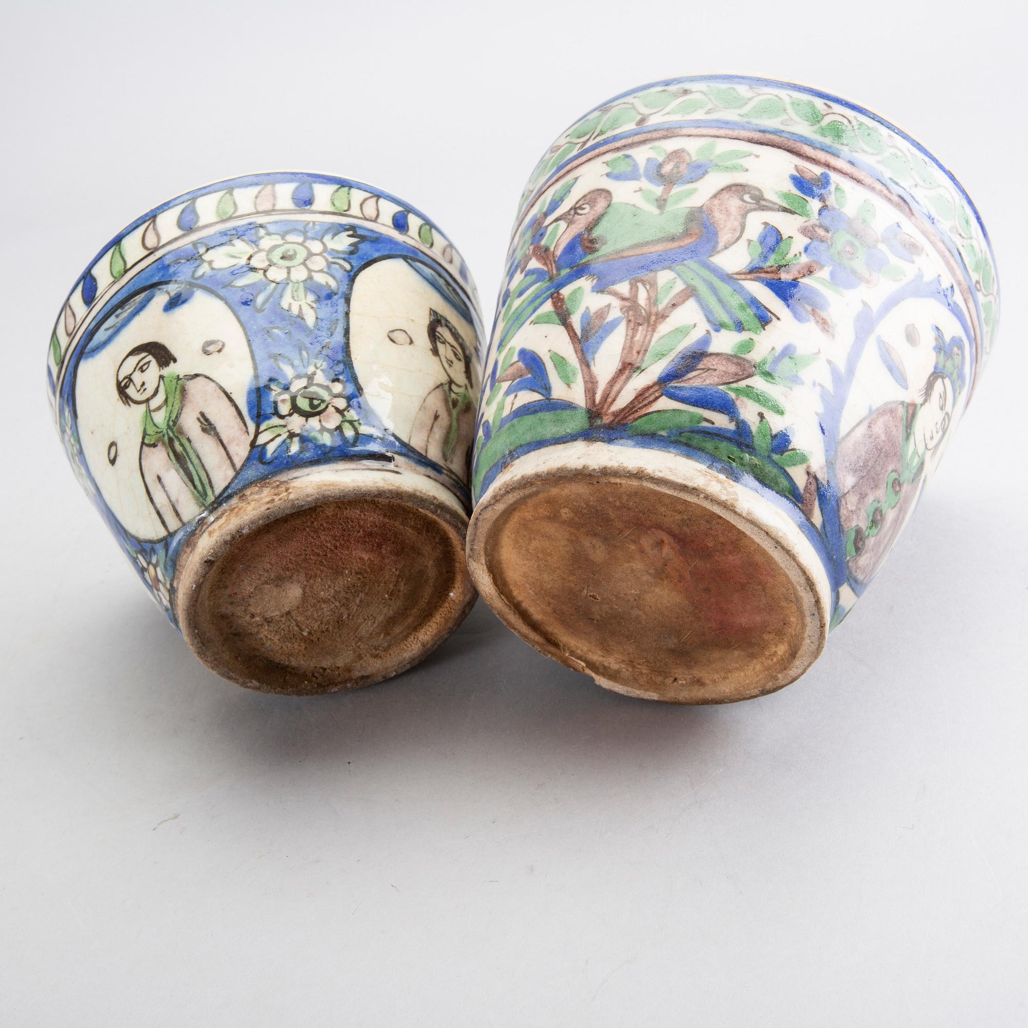 A set of two 19th century Persian earthenware pots.