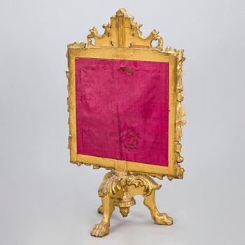 A Baroque style/Rococo revival brass protection, late 19th century.