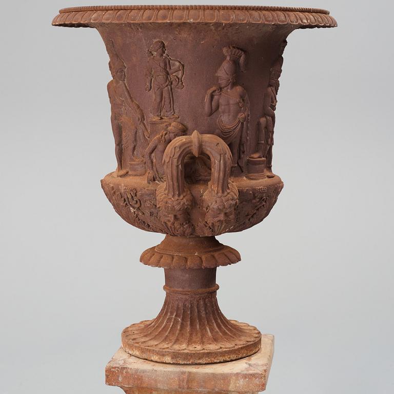 An around year 1900 iron garden Medici vase.