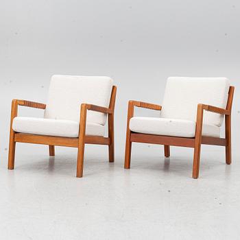 Carl Gustaf Hiort af Ornäs, a matched pair of 'Rialto' lounge chairs, Puunveisto Oy - Träsnideri Ab, Finland, mid-20th century.