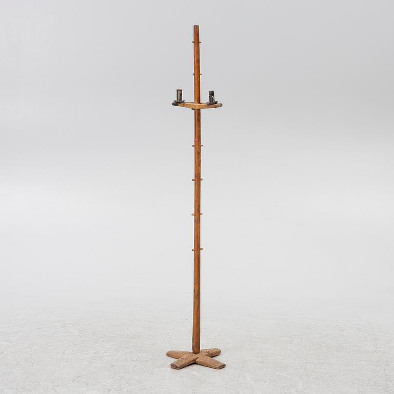 A floor candlestick, 19th Century.
