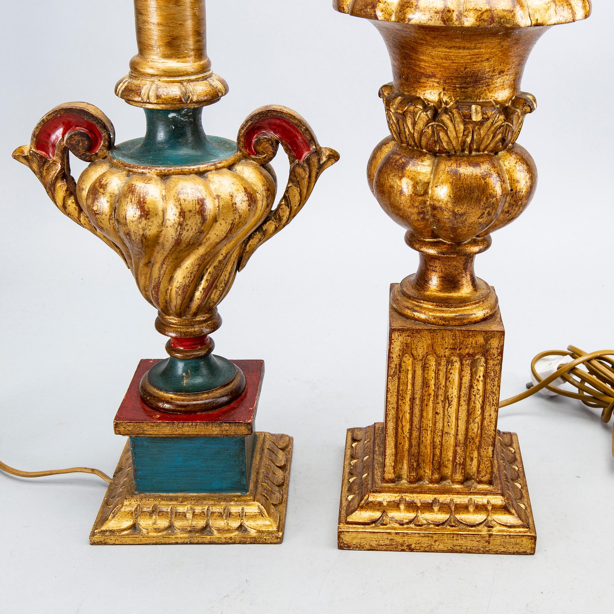Four mid 20th century wood table lamps from Paoletti, Firenze Italy.