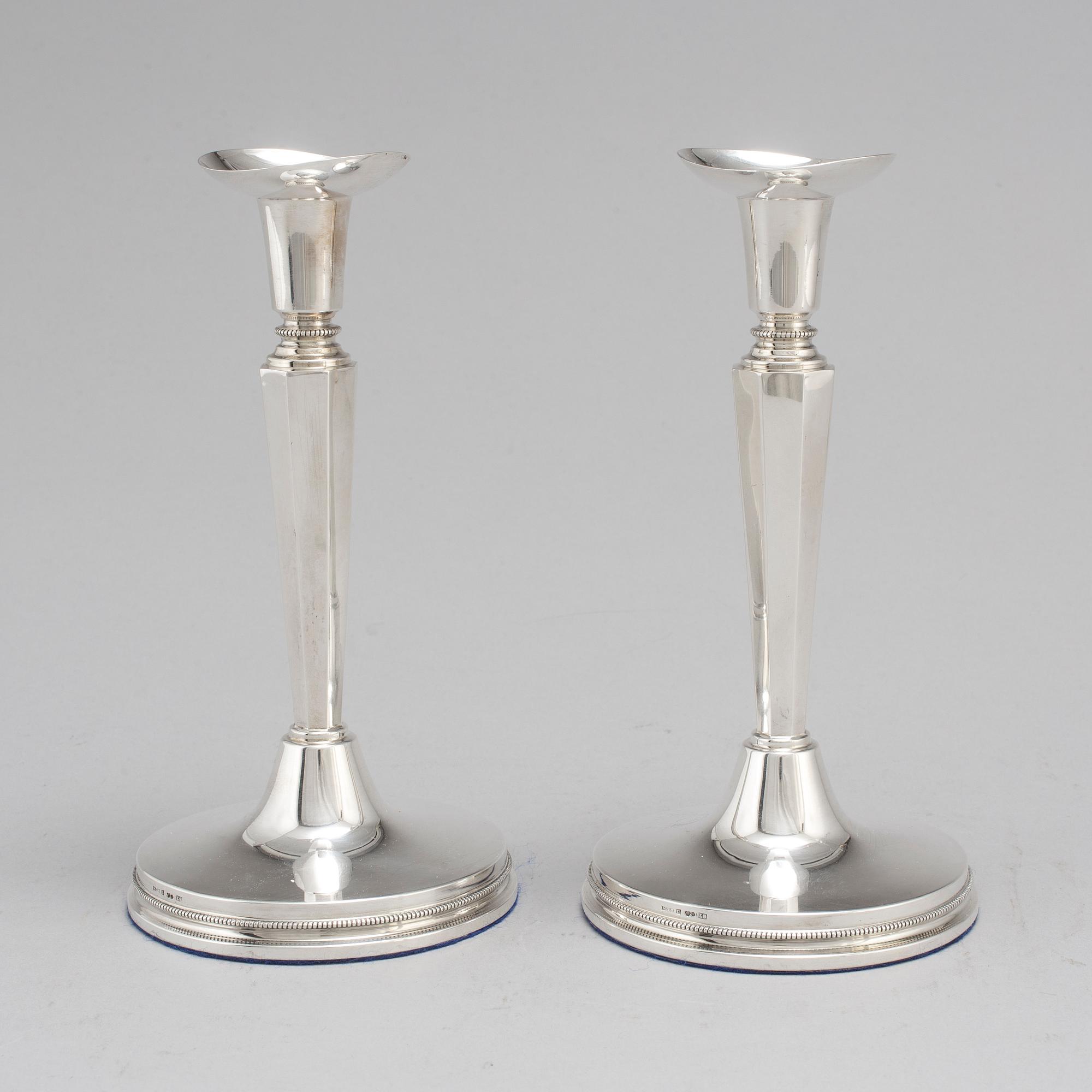 A pair of silver candle sticks by Eric Löfman, Uppsala 1961.