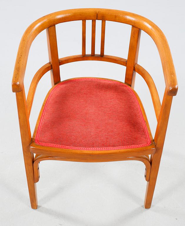 A table and a arm chair from the second quarter of the 20th century.