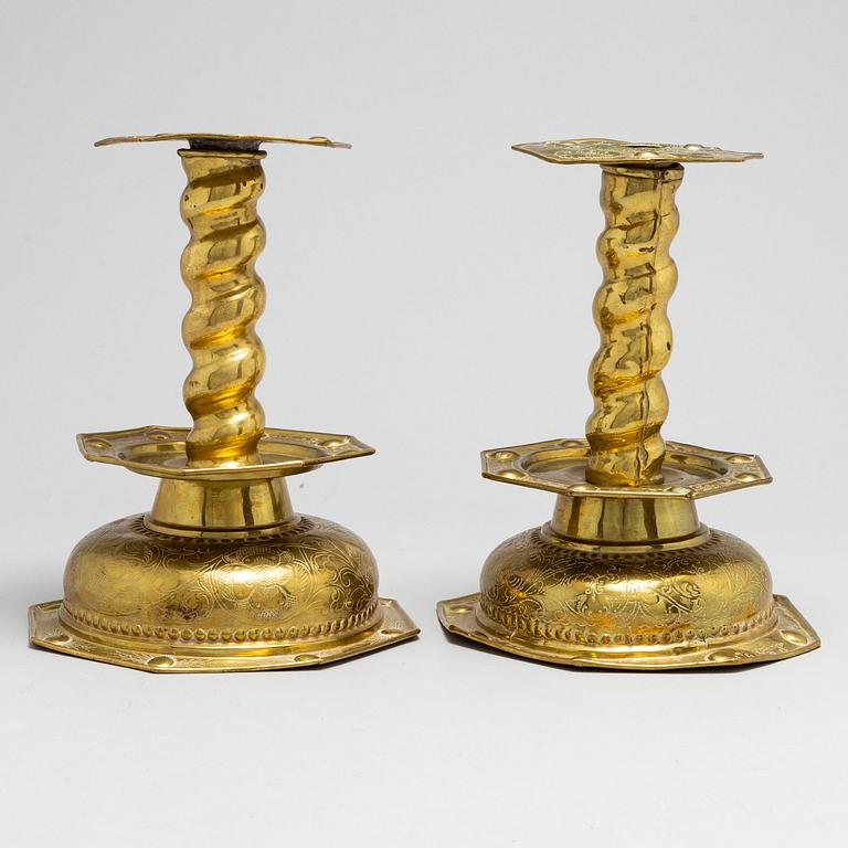 Two Swedish Baroque brass candlesticks, second half of the 17th century.