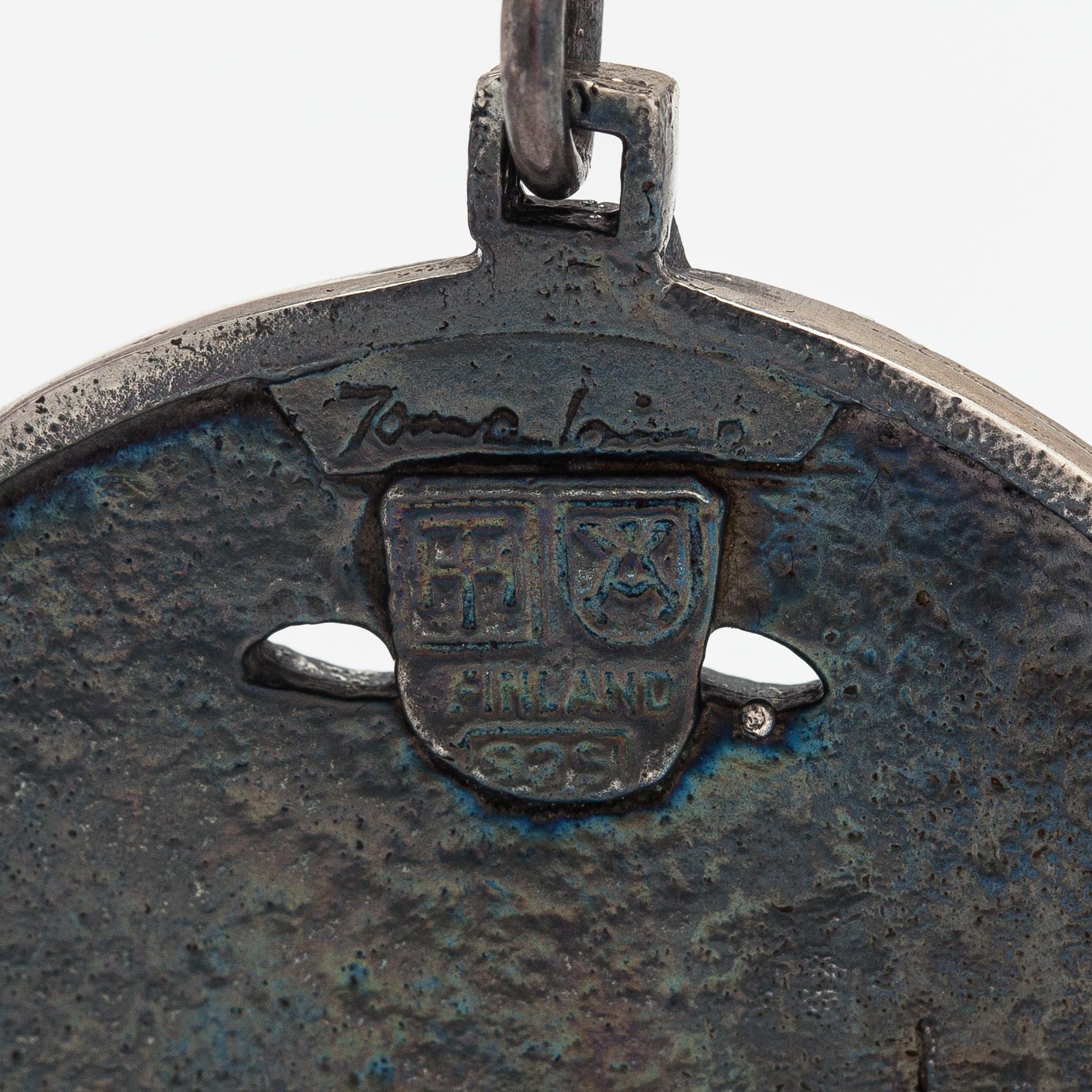 Jorma Laine, A sterling silver necklace "Face mask". Turun Hopea, Turku.