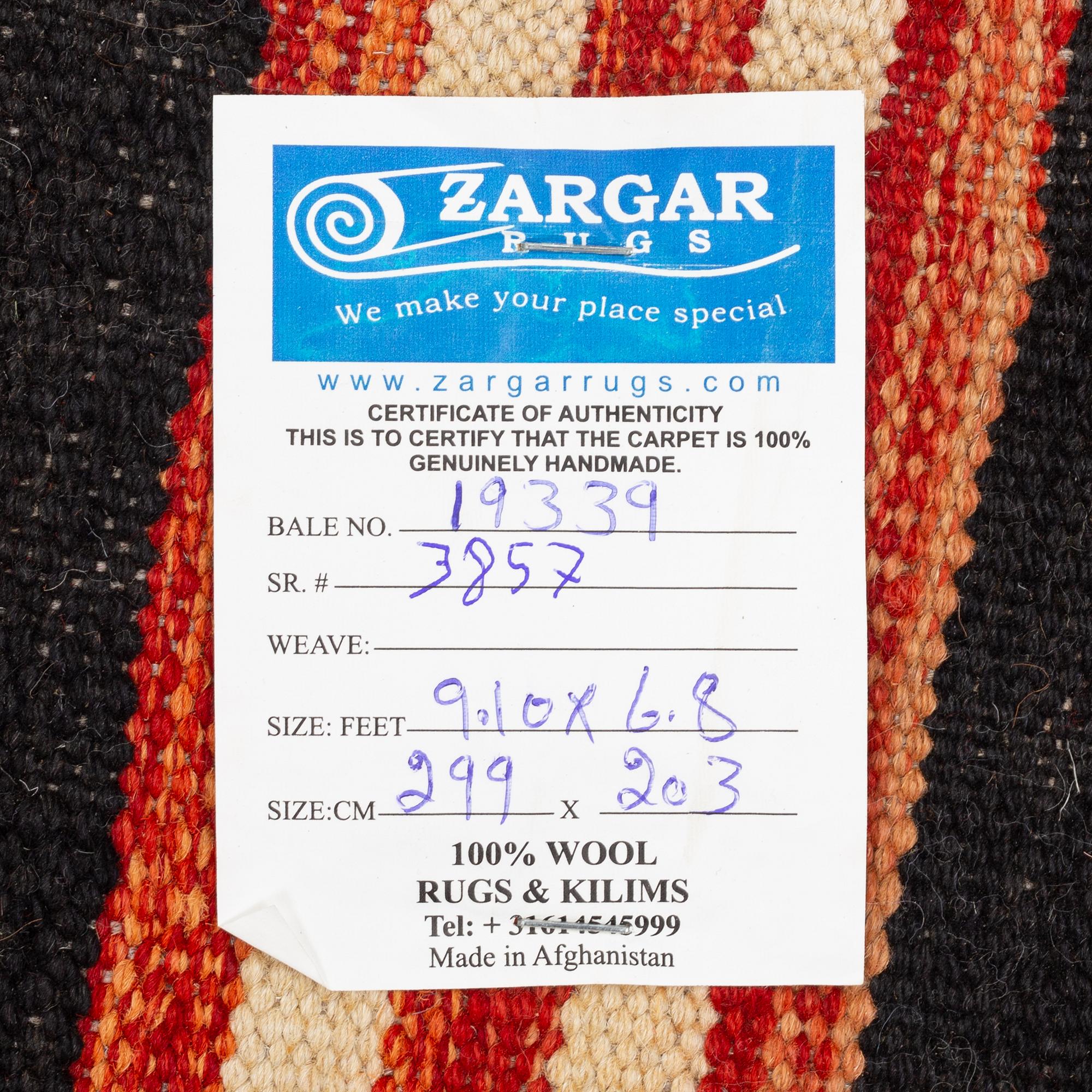 A Kilim carpet, c. 299 x 202 cm.