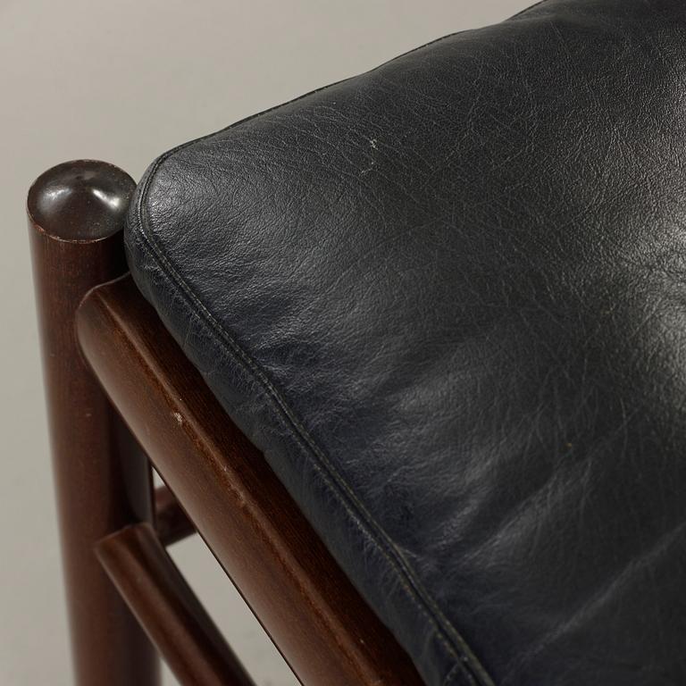 Ole Wanscher, a stained mahogany and black leather 'Colonial Chair PJ 149' and ottoman, Poul Jeppesen, Denmark.