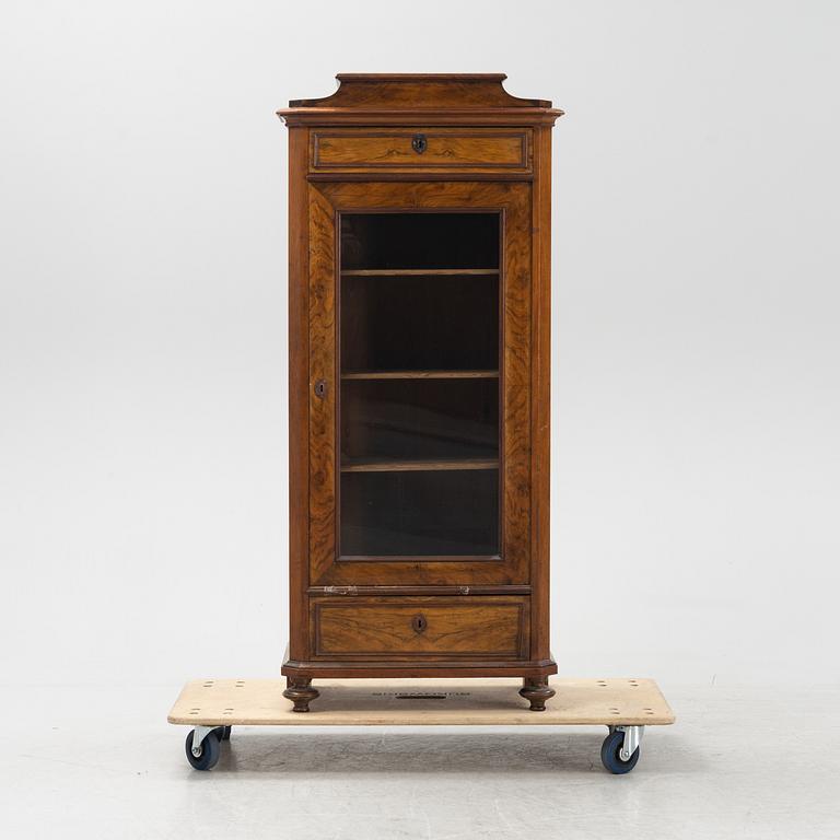A walnut veneered cabinet, second half of the 19th Century.