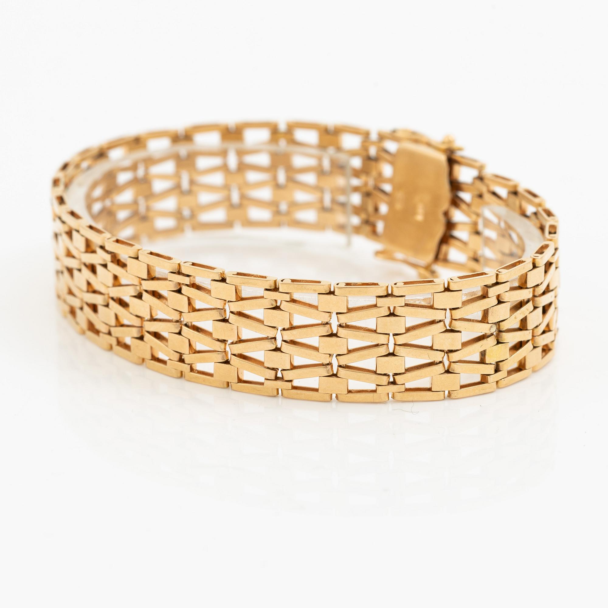 Arm bracelet, 18K gold.