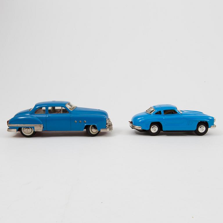 Two tinplate cars by Schuco and Kato Sairen German and Japan 1950s.