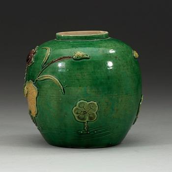 A green, aubergine and yellow glazed bisquit jar, Qing dynasty, 19th Century.