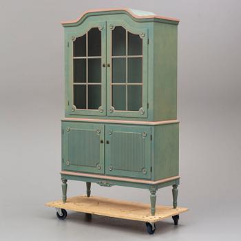 A Gustavian style cabinet, late 20th Century.